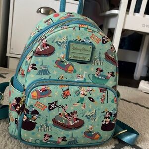 Disney mini backpack- bought at Disneyland -adult sizing brand new- lounge fly